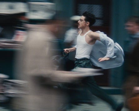 Film still from Marty Supreme showing Timothée Chalamet arsenic Marty Mauser running