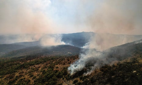 Smoke rises as a wildfire burns at Dadia national park in the region of Evros, Greece.