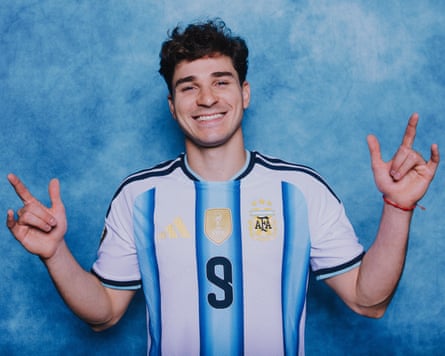 Julián Álvarez of Argentina poses for a image successful beforehand of a bluish backdrop earlier nan 2026 World Cup