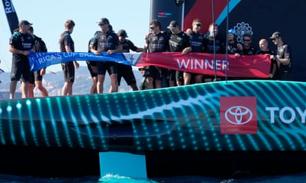 Team New Zealand celebrate their triumph