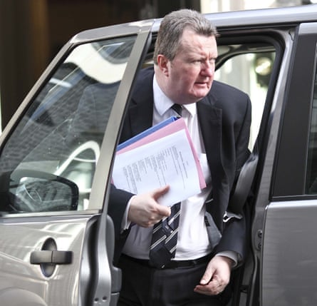 Then assistant commissioner at the Met police, Bob Quick, arrives at Downing Street showing confidential papers to the press in April 2009.