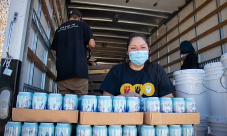 Krystal Curley partners with tribal employees to deliver water and other essentials to homes in rural parts of the reservation where electricity hookups and water access are rare.