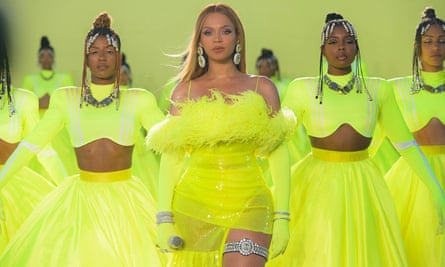 beyonce with others in bright yellow-green dresses