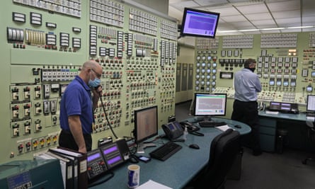 Reactor operators Eugene Vanderbeek, left, and Andrew Goerres monitor Unit 3 from a control room at Indian Point Energy Center. The plant has provided about 1,000 well-paid jobs.