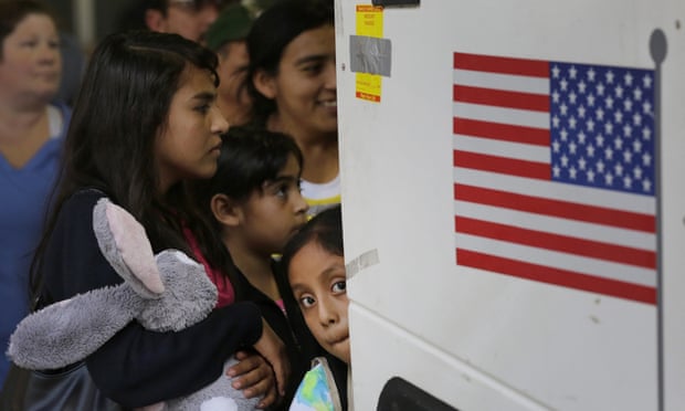FILE - In this July 7, 2015 file photo, immigrants from El Salvador and Guatemala who entered the country illegally board a bus after they were released from a family detention center in San Antonio. A group of immigrant rights lawyers in a filing Thursday, Aug. 13, 2015, say that detention of women and children caught crossing the U.S.-Mexico border illegally is lengthy and unsafe, challenging the government’s claims that immigrant families are held only briefly and that their detention doesn’t violate a longstanding ban. (AP Photo/Eric Gay, File)