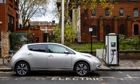 An electric vehicle on charge on a London street.