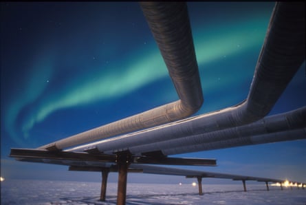An aurora over an oil pipeline