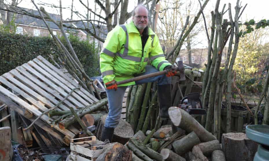 John Cossham salvages wood for fuel and food to eat and doesn’t own a car.