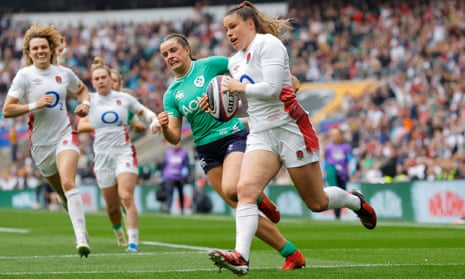 Jess Breach of England scores her team's seventh try.