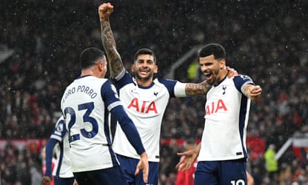 Dominic Solanke (right) celebrates scoring Tottenham's third goal with Pedro Porro and Cristian Romero.