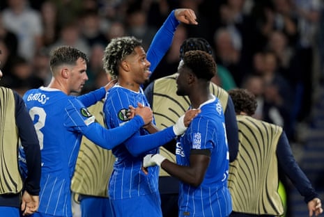 Georginio Rutter (centre) celebrates with Pascal Gross (left) and Ibrahim Osman after scoring Brighton’s third goal.