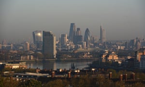 A haze of air pollution covers the London skyline in the early hours of the morning.