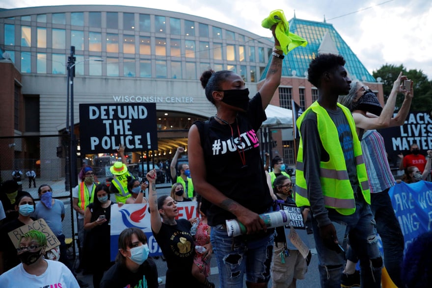 Demonstrators against racial injustice protest at the site of the Democratic National Convention (DNC), which is mostly virtual, due to the coronavirus, in Milwaukee, Wisconsin, on 20 August.