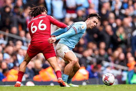 Trent Alexander-Arnold and Jack Grealish fight for the ball during Liverpool’s visit to Manchester City in April