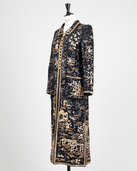 long black and gold embroidered coat with Chinese-style imagery