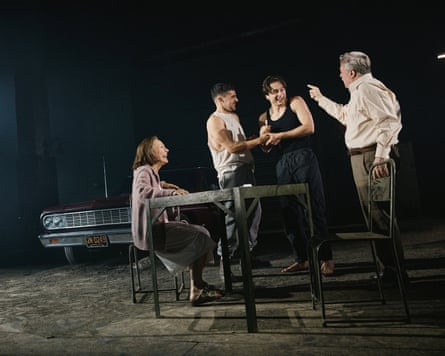 three men and a woman on stage