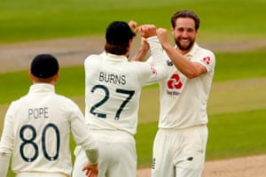 Woakes celebrates with teammates after taking Rizwan.