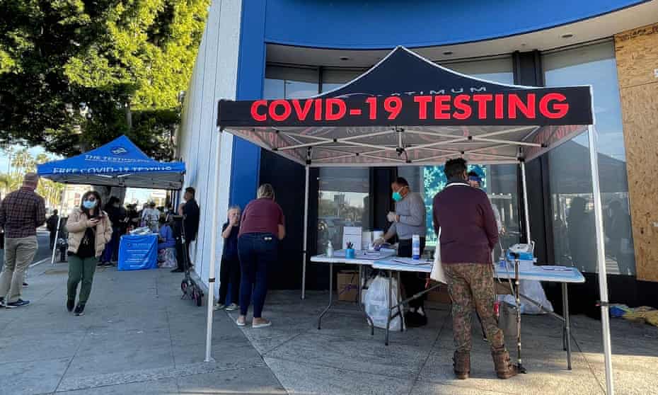 People register at a free Covid-19 testing tent in Los Angeles, California