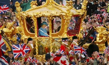 The Queen and the Duke of Edinburgh ride in the Golden State Carriage at the head of a parade celebrating her golden jubilee in June 2002.