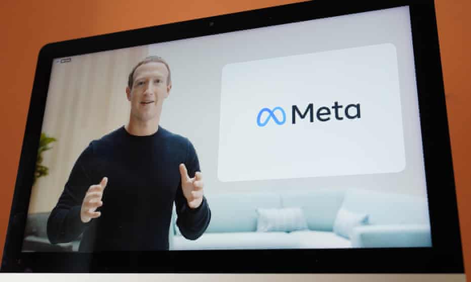 mark zuckerberg on screen in front of new logo