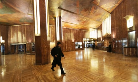 A man walks through the Chrysler building lobby on 9 January.