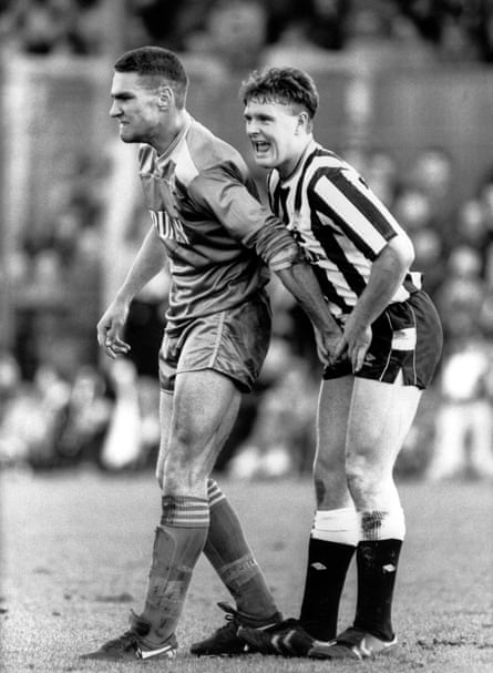 Wimbledon’s Vinnie Jones gets to grips with Newcastle United footballer Paul Gascoigne’s testicles during their League Division One match. 6th February 1988