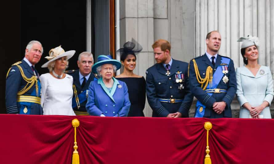 The royal family stand on the balcony of Buckingham Palace to view a flypast in July 2018.