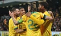 The Socceroos celebrate after scoring against Palestine in the second round of 2026 World Cup qualifiers