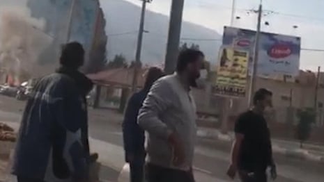Activists in Iran post video said to show crowd gathering around Mehdi Nekouyee