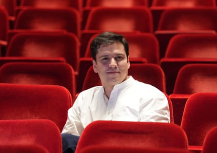 Demis Volpi sitting in a theatre.