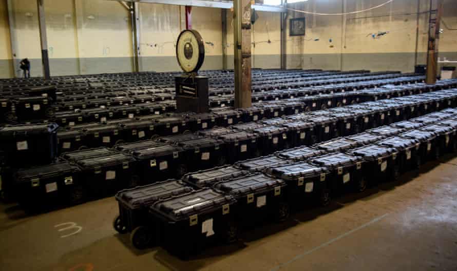 Election precinct suitcases containing ballots, election materials and keys to voting machines are held under guard by the Allegheny County Police at the Allegheny County elections warehouse on November 4, 2020 in Pittsburgh, Pennsylvania.