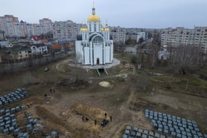 A mass grave reported to be seen next to a church in Bucha, on the outskirts of Kyiv, Ukraine.