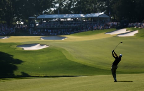 Scottie Scheffler of the United States plays a shot on the 15th hole.