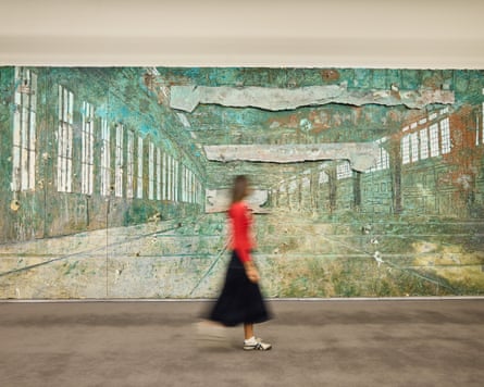 A woman walks in front of Tempelhof