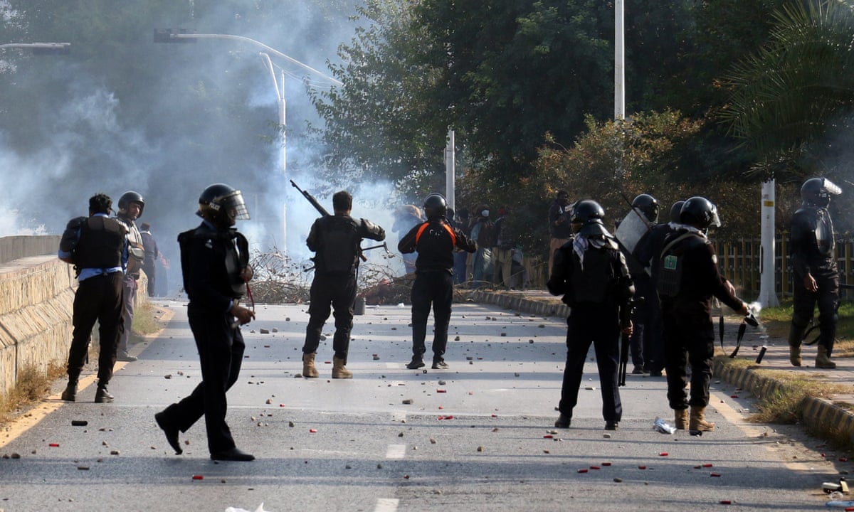 Pakistan army and police accused of firing on Imran Khan supporters | Pakistan | The Guardian