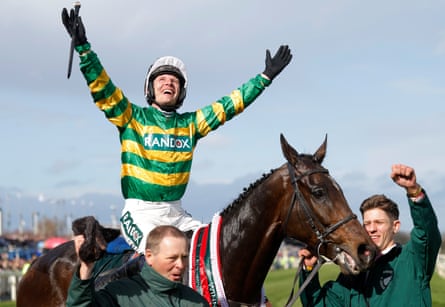 Paul Townend raises his arms in triumph on board I Am Maximus.