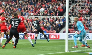 Aston Villa’s Mile Jedinak heads the visitors into the lead.