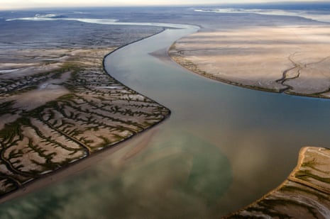 Aerial photograph of high tide in the Sea of Cortez flooding the dry Colorado River delta.