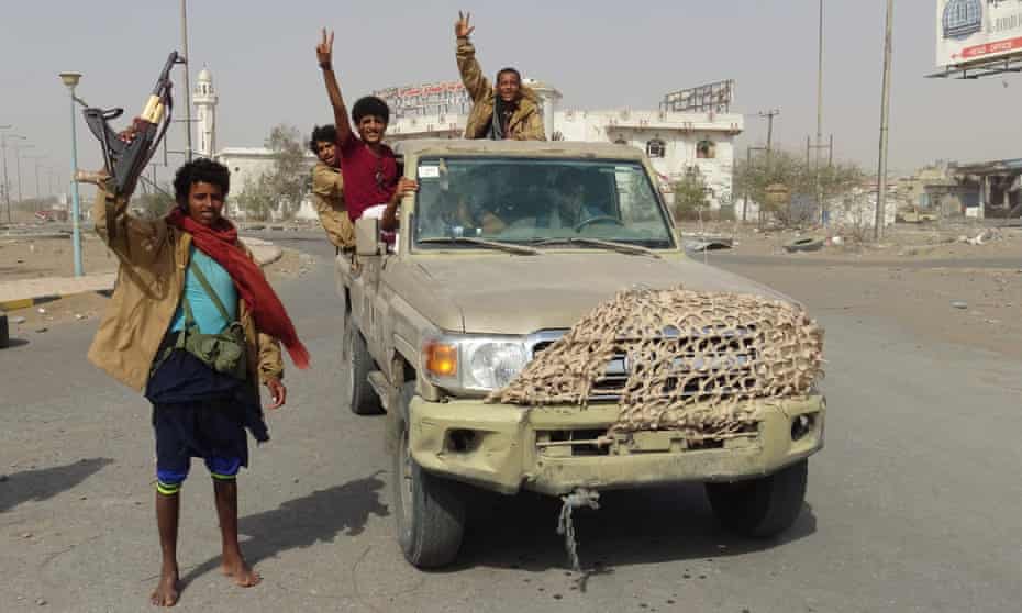 Yemeni pro-government forces gather in Hodeidah on Monday, shortly before the ceasefire was due to start.