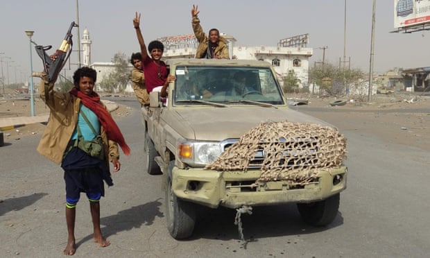 Yemeni pro-government forces gather in Hodeidah on Monday, shortly before the ceasefire was due to start.