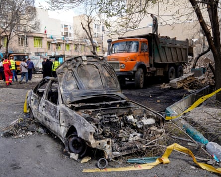 A burned out car on the street