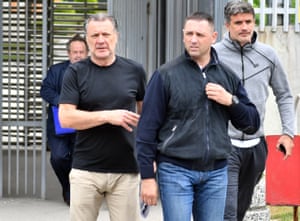 Zdravko Mamic (second right) and his brother Zoran (right) leave the court of Bosnia and Herzegovina after an extradition hearing on 15 June 2018.