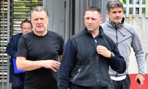 Zdravko Mamic (second right) and his brother Zoran (right) leave court in Bosnia-Herzegovina after an extradition hearing on 15 June 2018