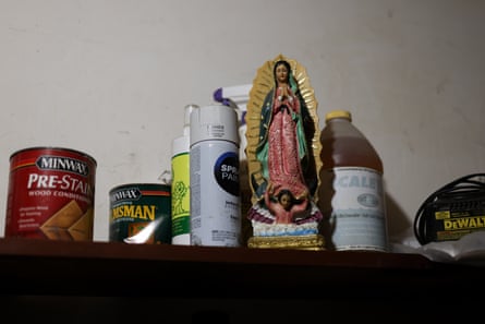 Christian memorabilia and woodworking supplies on a shelf
