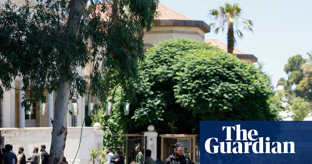 Explosions rock Damascus near hotel where French president was staying
