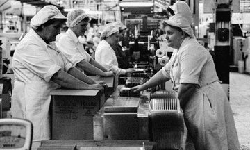 Women at a production line in a factory in a photo from To Let You Understand by Franki Raffles