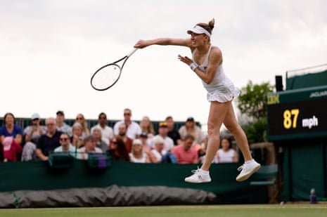 Ekaterina Alexandrova leaps into a serve.