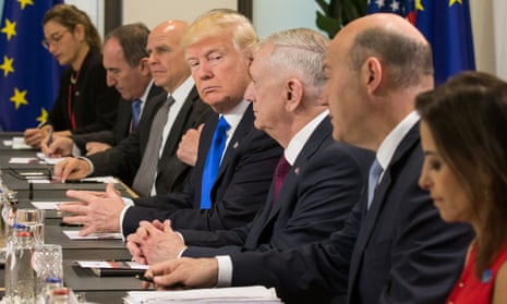 Donald Trump glances at James Mattis during a meeting in Brussels this week.