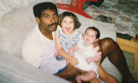 Amy McQuire as a child with her father and her younger sister Hayley