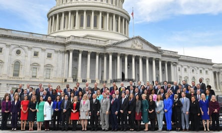 New members of Congress pose for a group photo at the US Capitol.